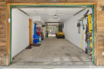 Spacious attached drive-thru garage, perfect for storing your toys and gearing up for your next adventure.