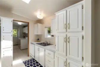 Floor to ceiling cabinets in kitchen.
