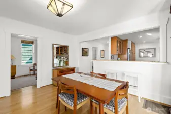 Here you can see the open-concept for the dining room and kitchen. With this open space the chef can be included in the conversation while still at work preparing the evening meal.
