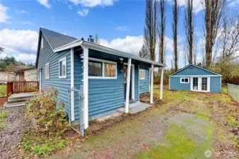 Lots of driveway space for parking on this level lot.