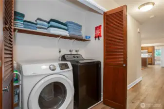 laundry closet with storage