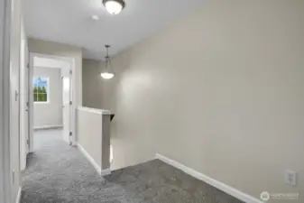 Second floor hallway with new carpets upstairs