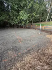 Shop site with electrical conduit and water