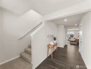 Entry flows into the living room - Photos are for representational purposes only, colors, elevation and features may vary.