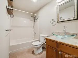 Full bath with laundry unit