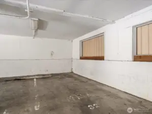 One dedicated parking spot #32 towards the back