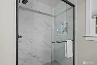 Primary walk-in shower.