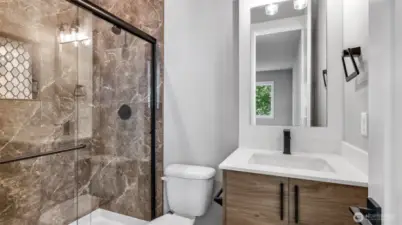 Convenient and private 3/4 Bath that's dedicated for the Guest Suite.