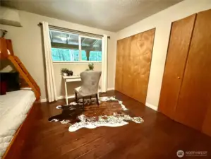 Another view of the bonus room with tons of storage space.
