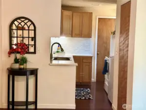 Beautifully updated backsplash and Corrian countertops.