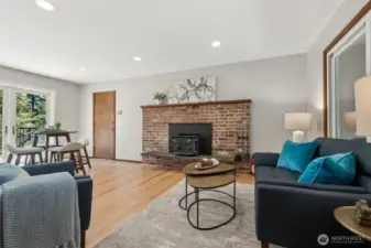 The family room, off the entry, the kitchen and French doors out to the deck.