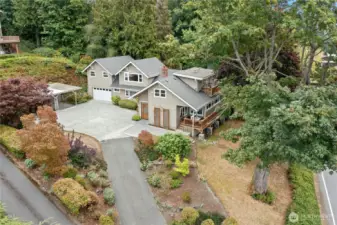 Panoramic Southwesterly views of Lake Washington, Magnuson Park, and stunning sunsets from both levels.