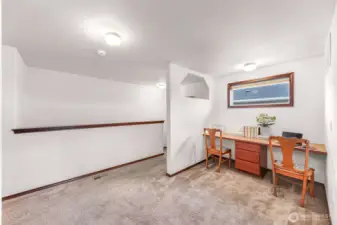 Upper level - Office or media space has plenty of room to spread out, envision it for your own use.  The upper long window lets in the southern light.