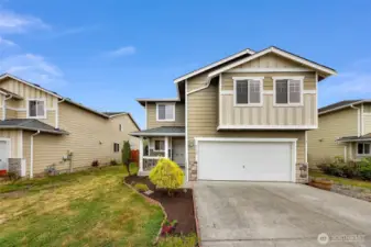 Plenty of space for 2 cars/trucks in driveway plus gravel area to your right.