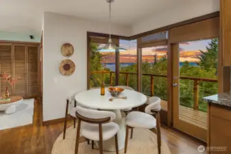 Dining room features a new door out to the main deck and leads into the sitting room.