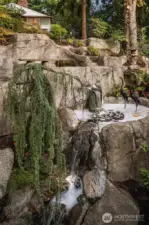 Custom hardscape with waterfalls.