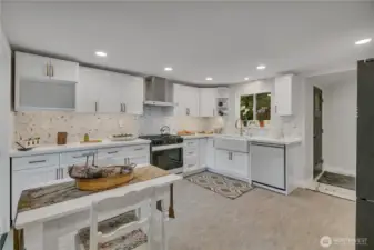 You could walk across the kitchen and right out the back door to the back deck and garage just through the laundry room and half bath or...