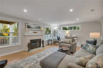 Opposite the hall bathroom is the entry hallway and this view on the right of the living room.
