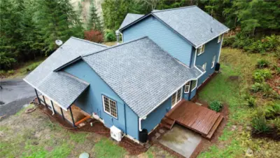 Stunning arial view highlights the homes brand new roof and beautifully maintained property. A move in ready exterior with major updates already complete.