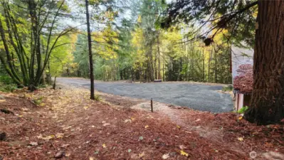 Open area next to where barn currently sits with tons of possibilities.