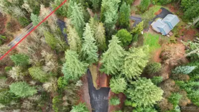 Photo showing Prather Road with driveway to home and driveway to barn. Peaceful, country like setting with easy access to town.