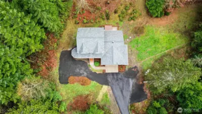 Brand new paved driveway from main road to house.