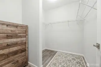 Walk-in closet for apartment bedroom on main floor with room for stackable washer/dryer