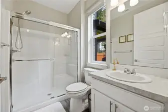 Main floor apartment bath with walk-in shower