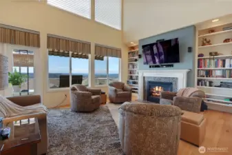 Great Room with deck access and sweeping views. Automatic Blinds included!