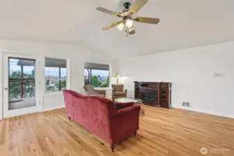 Living room has access to the covered front porch.