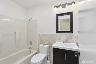 Second full bathroom located off the hall.