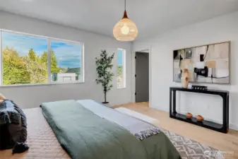 The primary suite is complete with a walk-in closet.