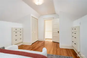 Two closets and built-in dresser spaces in the larger upper bedroom on back of the house