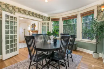 Formal dining room with bay windows