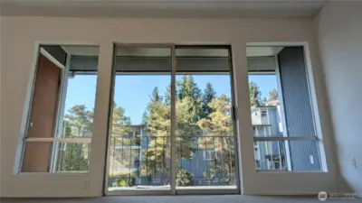 Large windows and sliding door.