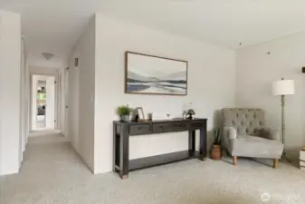 Down the hall, you have three bedrooms and 1 3/4 baths.