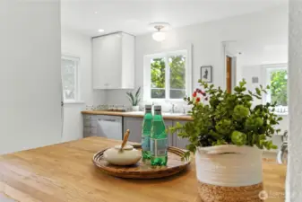 Butcher block counters in this bright kitchen!