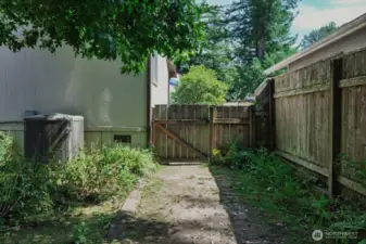 Gates on both sides to fully fenced back yard!