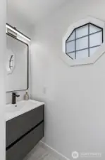 1/2 Bath on main finished with marble