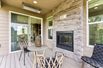 Outdoor living with fireplace and mounted heaters for year around enjoyment. Have your morning coffee or unwind after work with peaceful views.