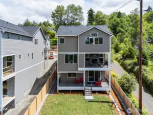 Three levels of flexible living, that backs to protected green space! (older photo-this community is 100% complete)