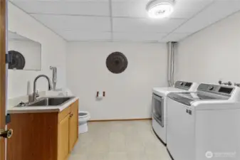Very spacious laundry room and 1/2 bath downstairs