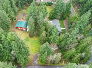 2.08 acres on a corner lot with updated home, attached garage, detached barn/garage, out buildings and pasture area.