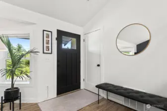 Open the door to fresh, modern interiors. This entry way has room for your bench seating and a coat closet.