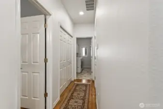 The main floor is completed with the guest ½ bath and laundry room with lots of cabinets and a utility sink.
