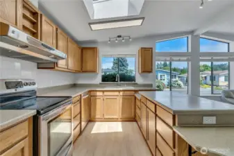 Bright open kitchen with skylight.