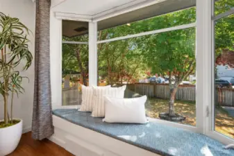 The window seat is the perfect place to sit and watch the passerby's.