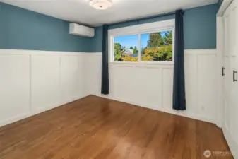 Bedroom #2 on the main level. The wainscoting is adorable.