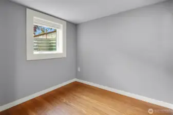 The 5th bedroom with new conforming window. The built-in closet is just out of view.