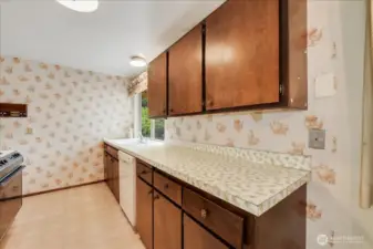 Galley style kitchen could easily be opened up to the living room to create a fabulous open plan space.